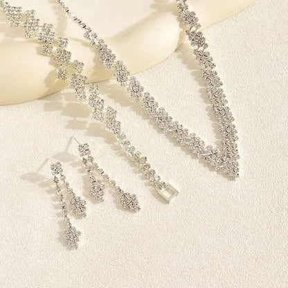 Bridal Jewelry in Crystal, Silver, Earrings, Necklace and Bracelet